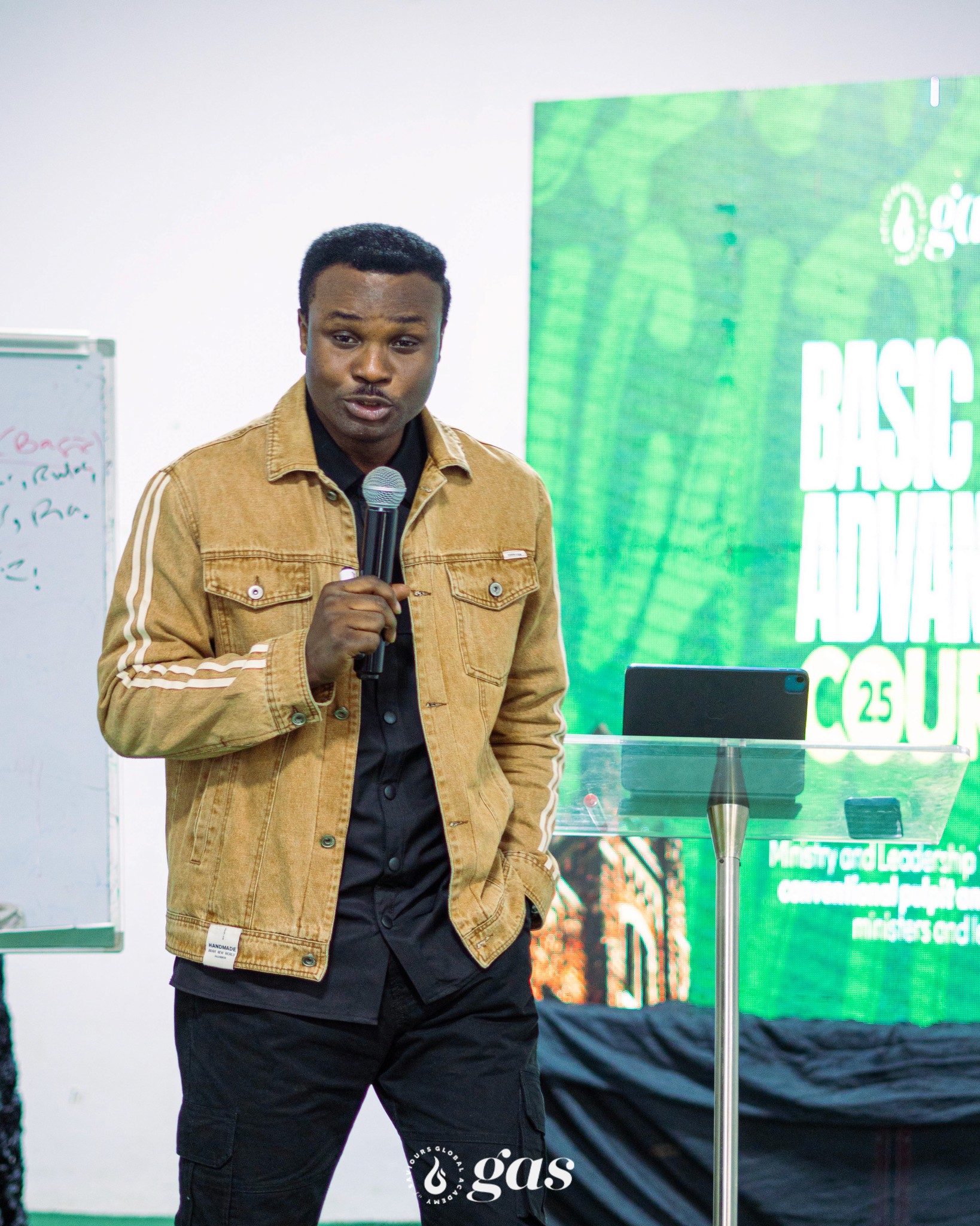 Dr. Karis Ameh Wealth teaching at a session